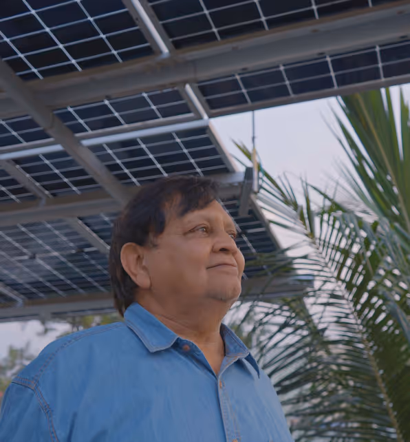 A happy family looking at their solar panel